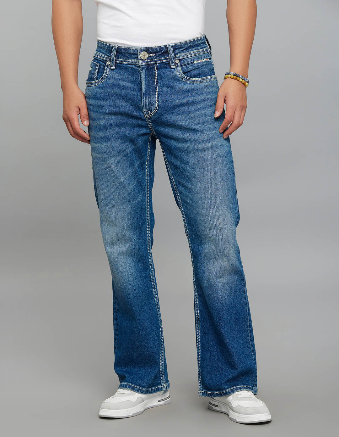 Med Blue Pocket Mid Rise Cropped Length Loose Boot Leg Stretch