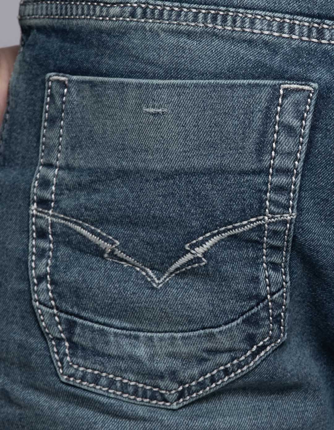 Med Blue 5 Pocket Mid Rise Loose Boot Leg Jeans