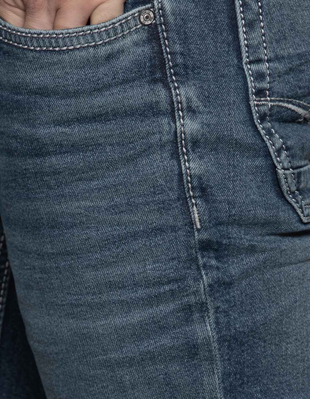 Med Blue 5 Pocket Mid Rise Loose Boot Leg Jeans