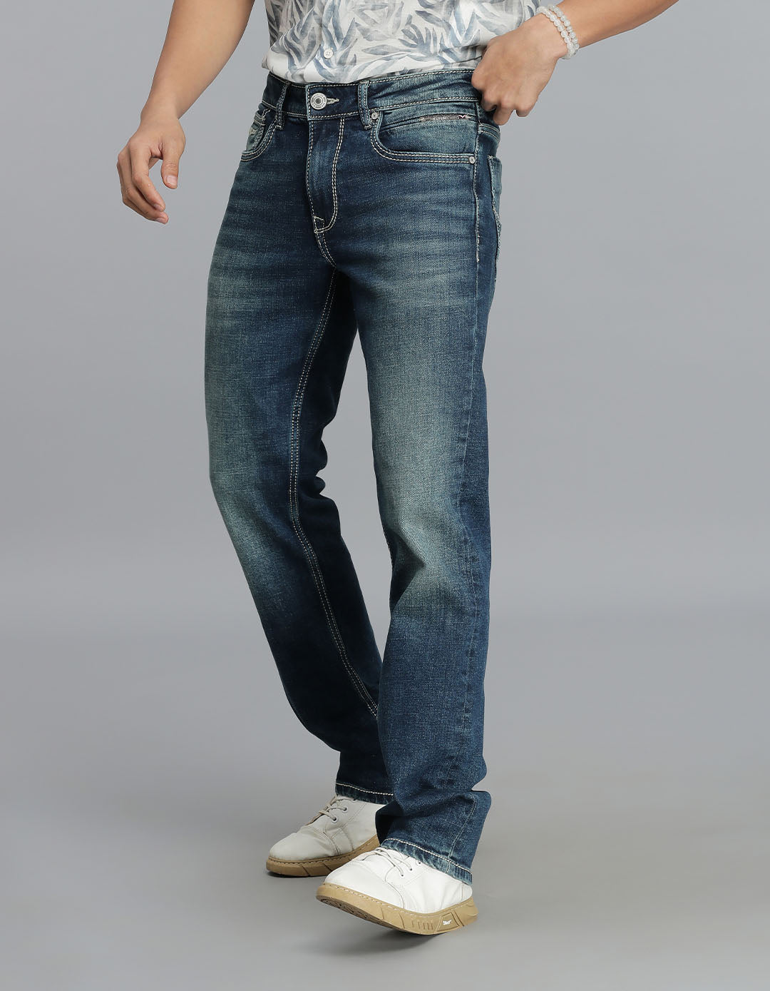 Med Blue 5 Pocket Mid Rise Loose Boot Leg Jeans