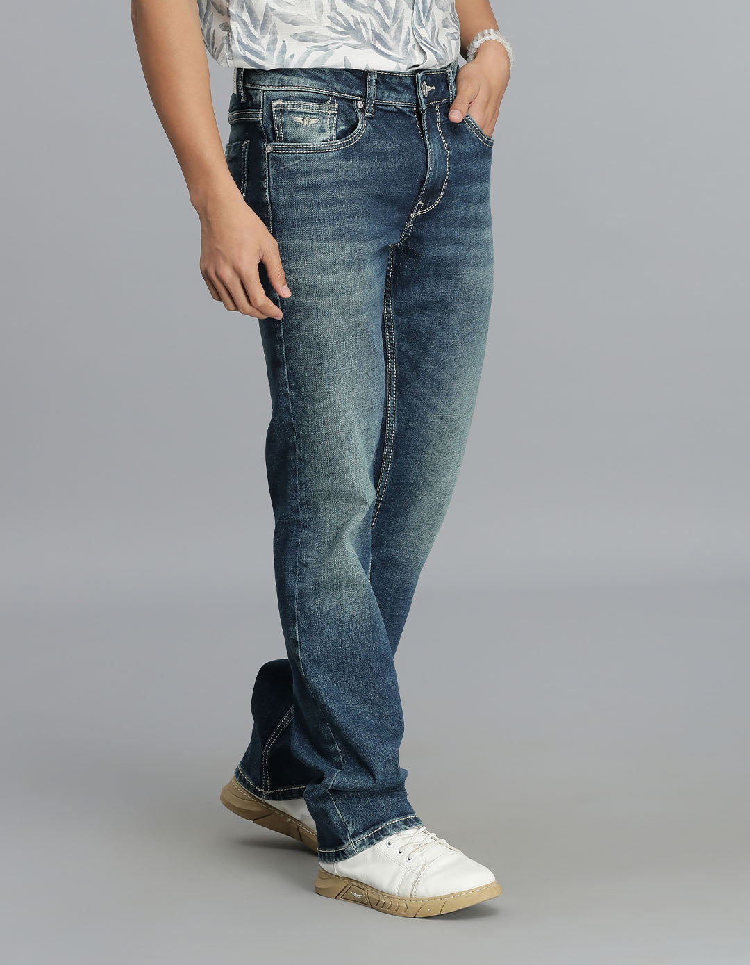 Med Blue 5 Pocket Mid Rise Loose Boot Leg Jeans