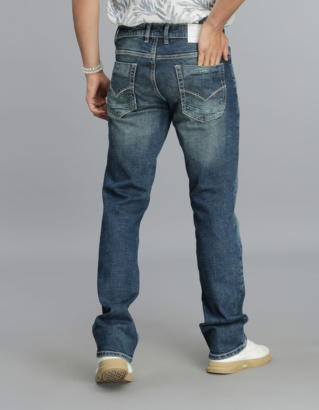 Med Blue 5 Pocket Mid Rise Loose Boot Leg Jeans