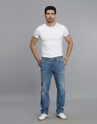 Med Blue 5 Pocket Mid Rise Loose Boot Leg Jeans