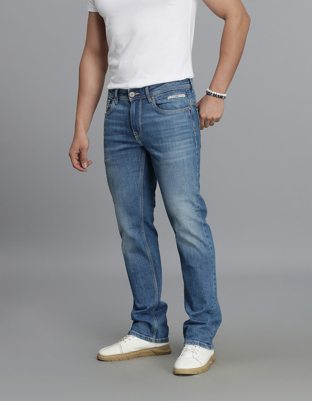 Med Blue 5 Pocket Mid Rise Loose Boot Leg Jeans
