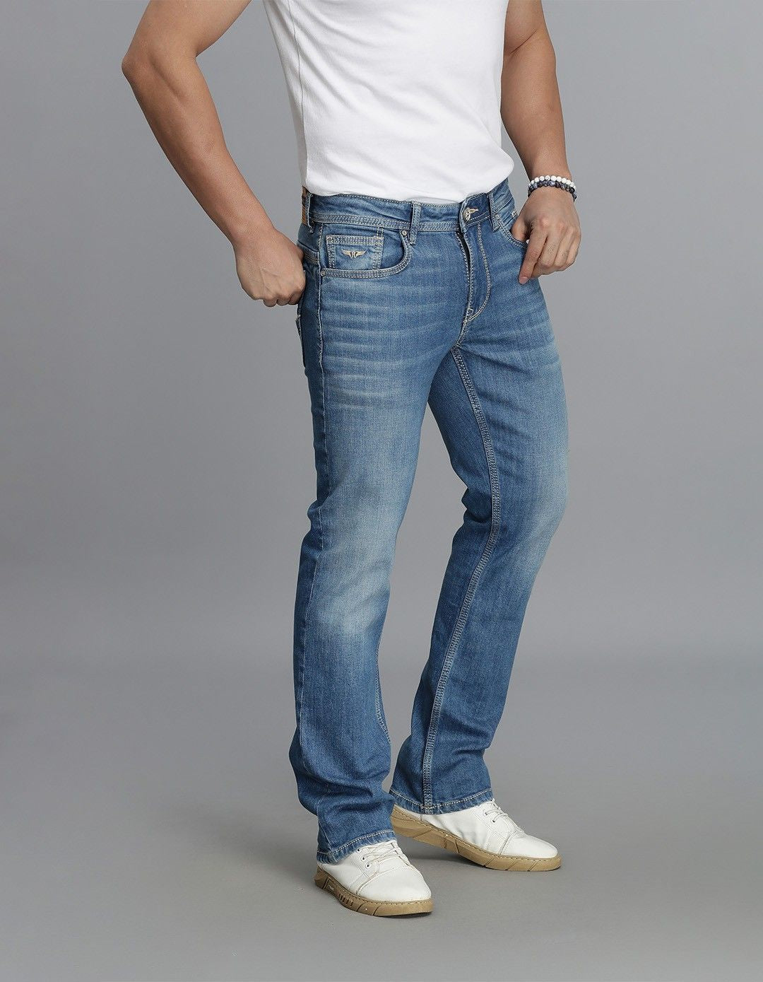 Med Blue 5 Pocket Mid Rise Loose Boot Leg Jeans