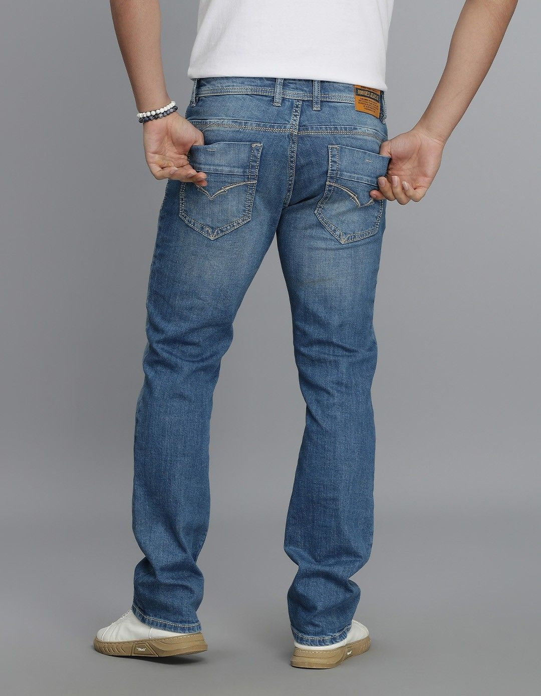 Med Blue 5 Pocket Mid Rise Loose Boot Leg Jeans