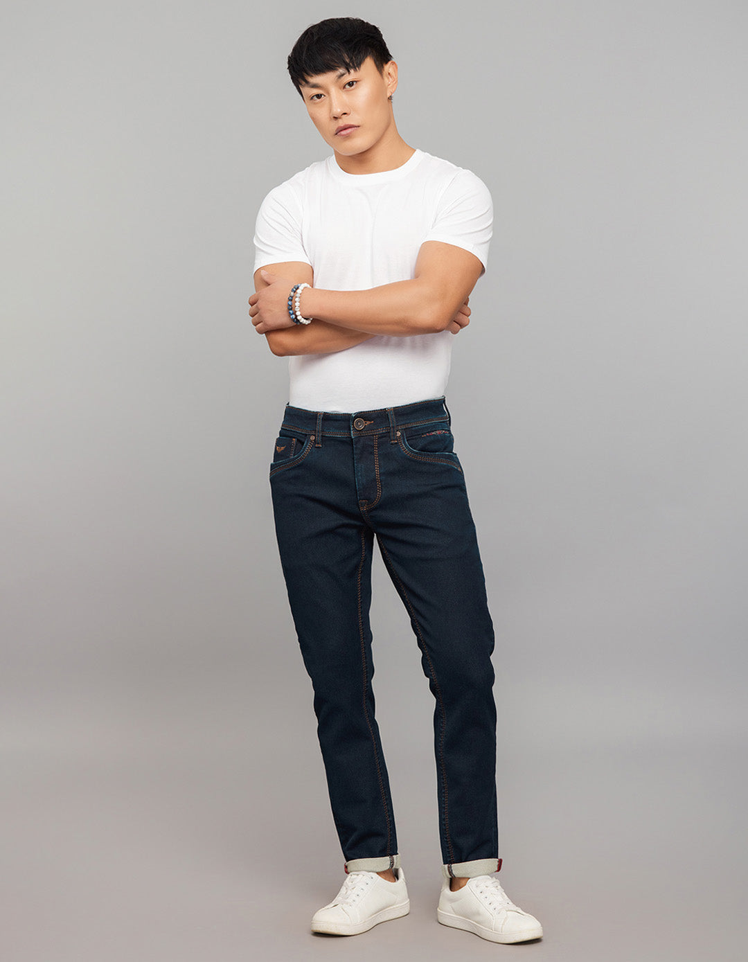 Dark Blue 5 Pocket Low-Rise Tapered Ankle Length Knit Denim Jeans