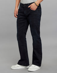 Dark Blue 5 Pocket Mid Rise Cropped length Loose Boot Leg Stretch Jeans