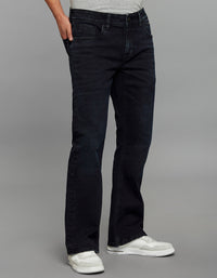 Dark Blue 5 Pocket Mid Rise Cropped length Loose Boot Leg Stretch Jeans