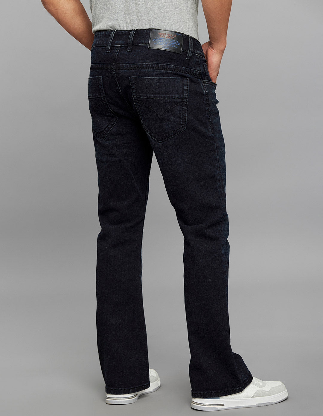 Dark Blue 5 Pocket Mid Rise Cropped length Loose Boot Leg Stretch Jeans
