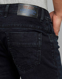 Dark Blue 5 Pocket Mid Rise Cropped length Loose Boot Leg Stretch Jeans