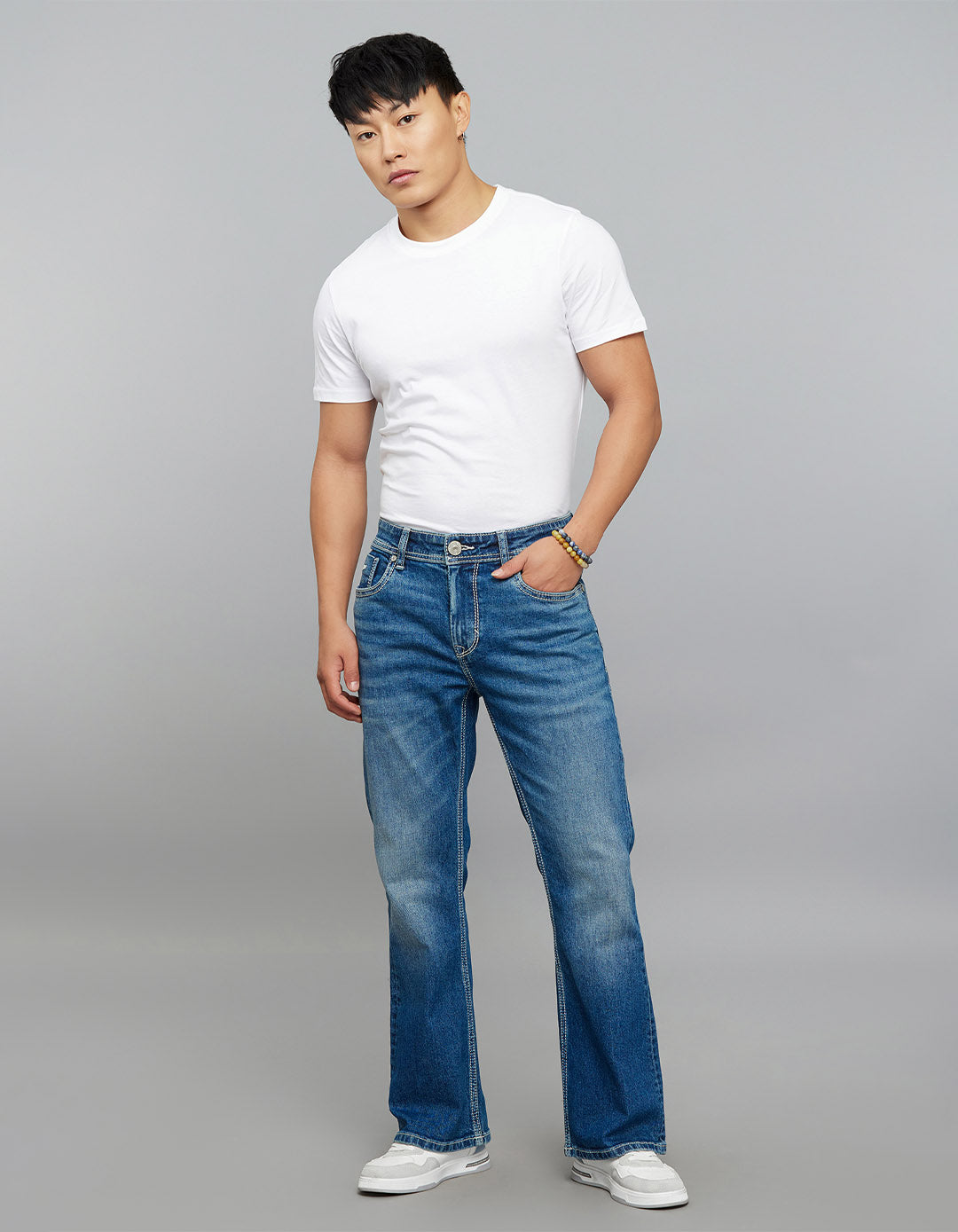 Med Blue 5 Pocket Mid Rise Cropped Length Loose Boot Leg Stretch Jeans