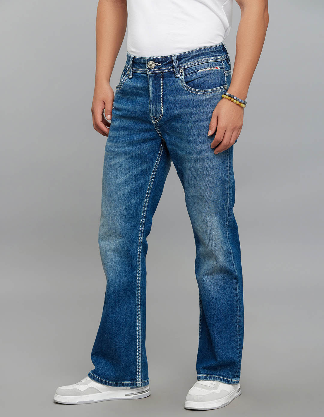 Med Blue 5 Pocket Mid Rise Cropped Length Loose Boot Leg Stretch Jeans