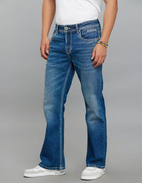 Med Blue 5 Pocket Mid Rise Cropped Length Loose Boot Leg Stretch Jeans