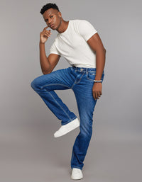 Medium Blue 5 Pocket Mid Rise Loose Boot Leg Stretch Jeans
