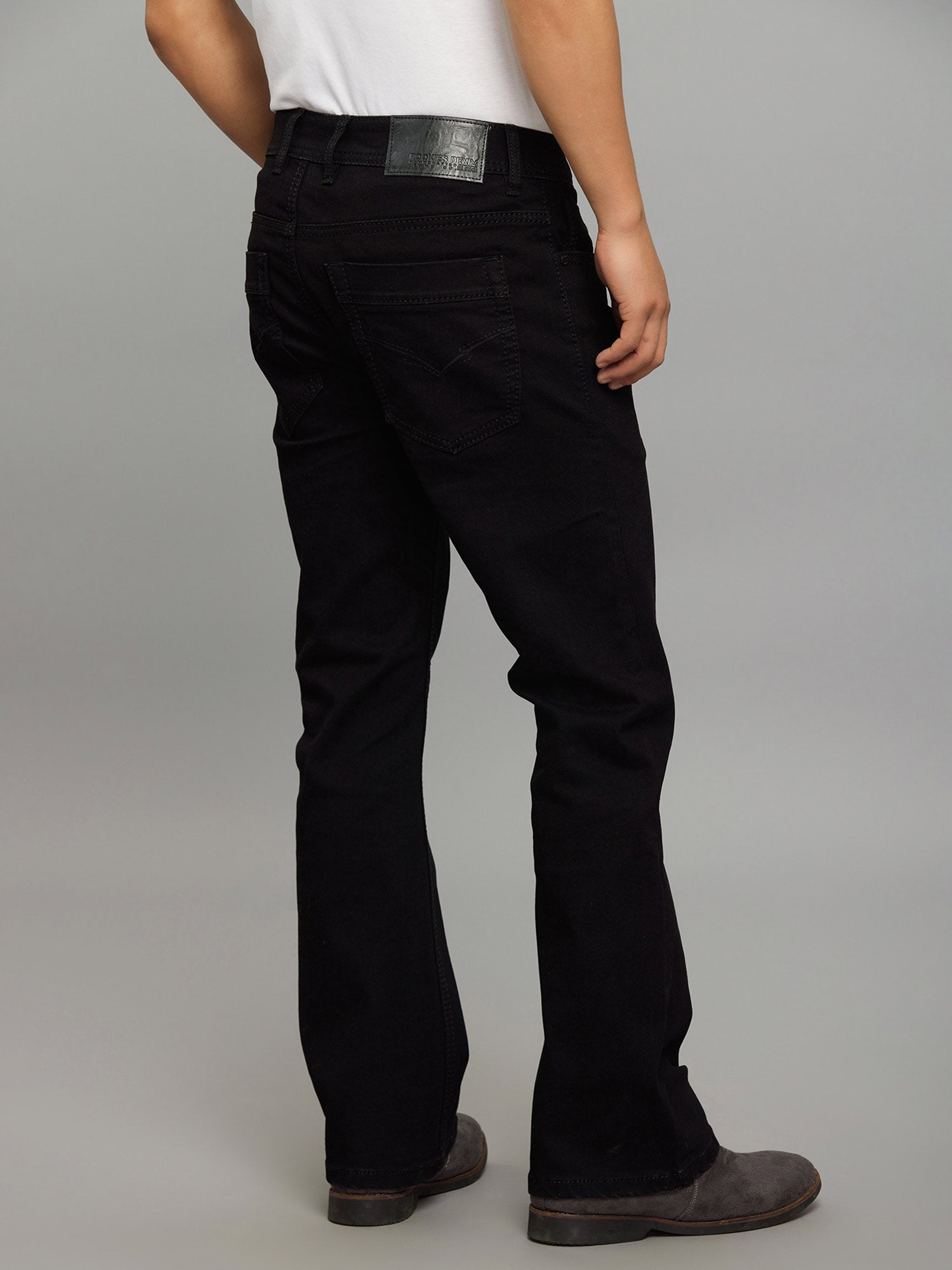 Black 5 Pocket Mid Rise Cropped Length Loose Boot Leg Stretch Jeans