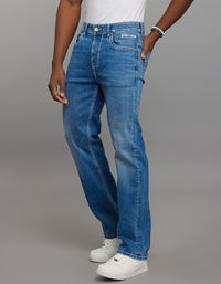 Medium Blue 5 Pocket Midrise Loose Fit Stretch Jeans