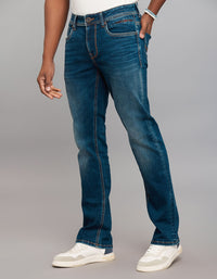 Dark Blue 5 Pocket Mid Rise Loose Boot Leg Stretch Jeans