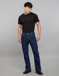 Dark Blue 5 Pocket Mid Rise Cropped length Loose Boot Leg Stretch Jeans