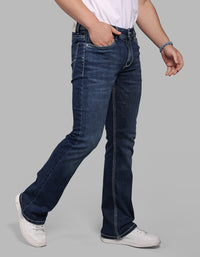 Med Blue 5 Pocket Mid Rise Loose Boot Leg Stretch Jeans