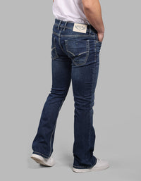 Med Blue 5 Pocket Mid Rise Loose Boot Leg Stretch Jeans