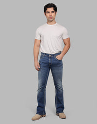 MED BLUE 5 Pocket Mid Rise Loose Boot Leg Stretch Jeans