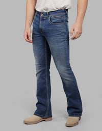 MED BLUE 5 Pocket Mid Rise Cropped length Loose Boot Leg Stretch Jeans
