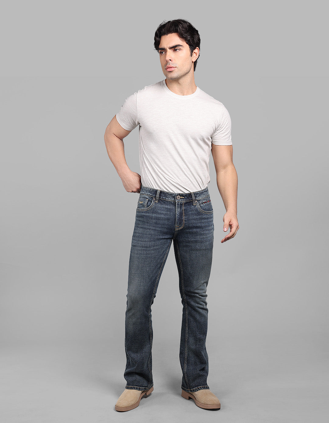 Med Blue 5 Pocket Mid Rise Loose Boot Leg Stretch Jeans