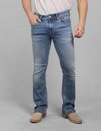 Med Blue Mid Rise Cropped Length Loose Boot Leg Stretch Jeans