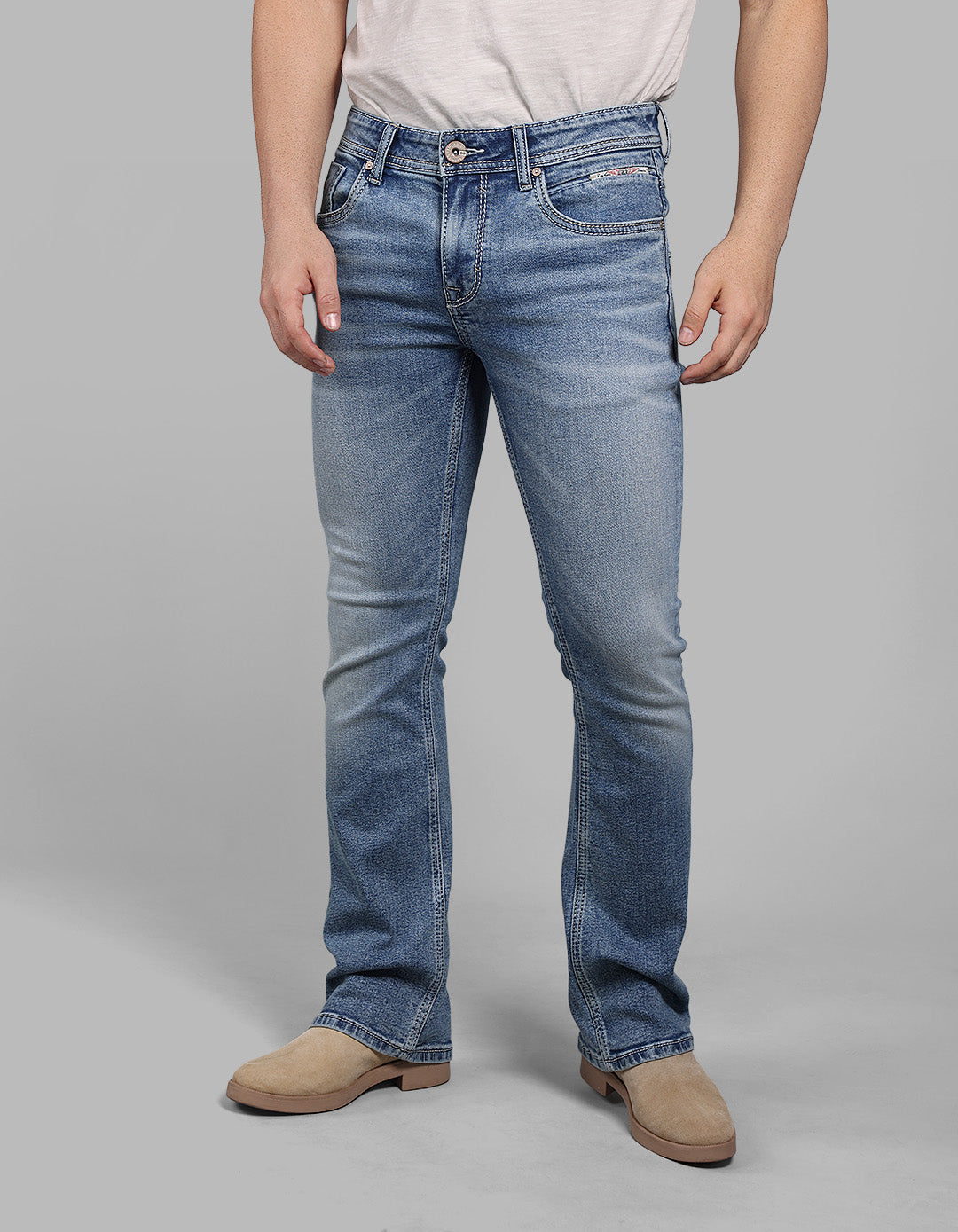 Med Blue 5 Pocket Mid Rise Loose Boot Leg Stretch Jeans