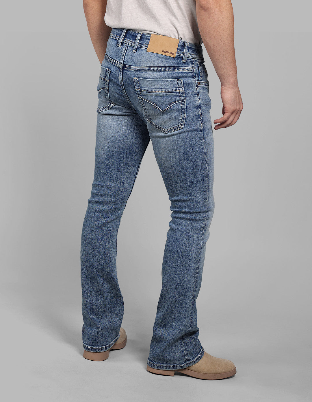 Med Blue Mid Rise Cropped Length Loose Boot Leg Stretch Jeans