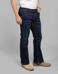 Dk Blue 5 Pocket Mid Rise Cropped Length Loose Boot Leg Stretch Jeans