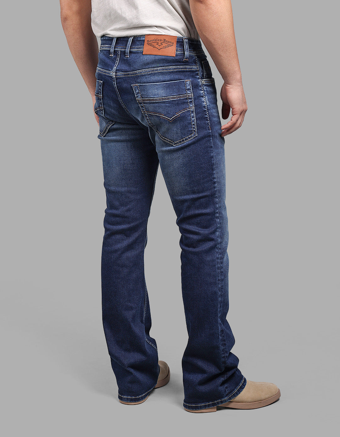 Med Blue Mid Rise Cropped Length Loose Boot Leg Stretch Jeans