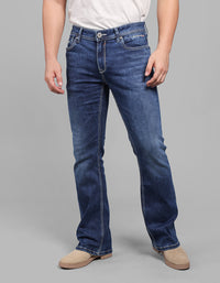 Med Blue 5 Pocket Mid Rise Loose Boot Leg Stretch Jeans