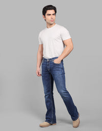 Med Blue 5 Pocket Mid Rise Loose Boot Leg Stretch Jeans