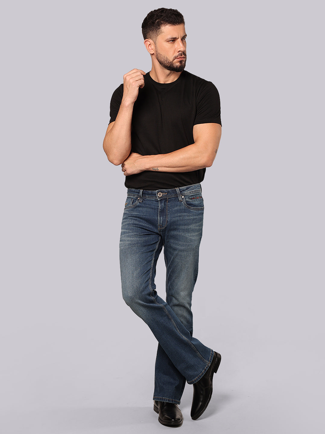 Med Blue Mid Rise Loose Boot Leg Stretch Jeans