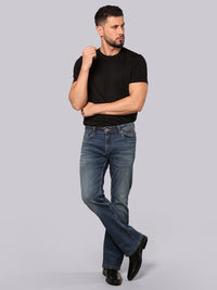 Med Blue Mid Rise Loose Boot Leg Stretch Jeans