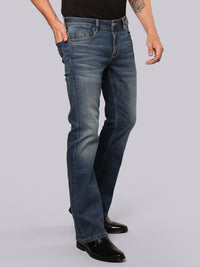 Med Blue Mid Rise Loose Boot Leg Stretch Jeans
