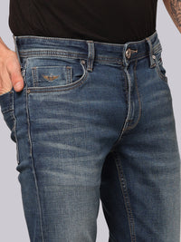 Med Blue Mid Rise Loose Boot Leg Stretch Jeans