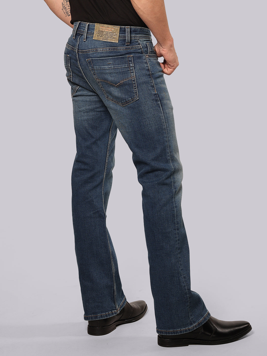 Med Blue Mid Rise Loose Boot Leg Stretch Jeans