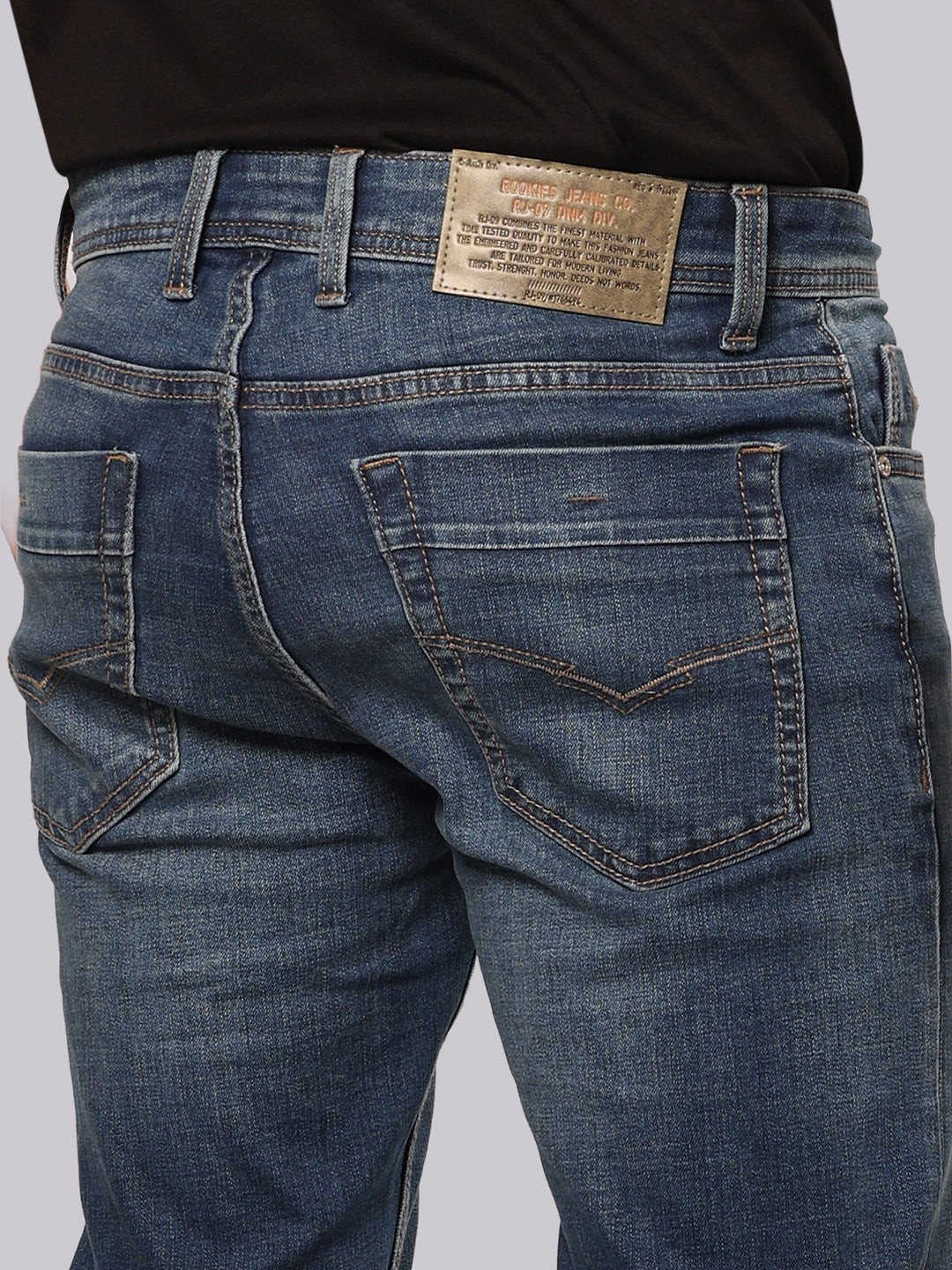 Med Blue Mid Rise Loose Boot Leg Stretch Jeans