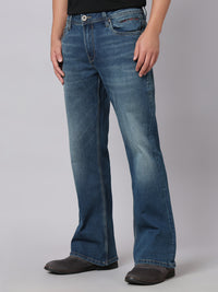 Med Blue Mid Rise Cropped Length Loose Boot Leg Stretch Jeans