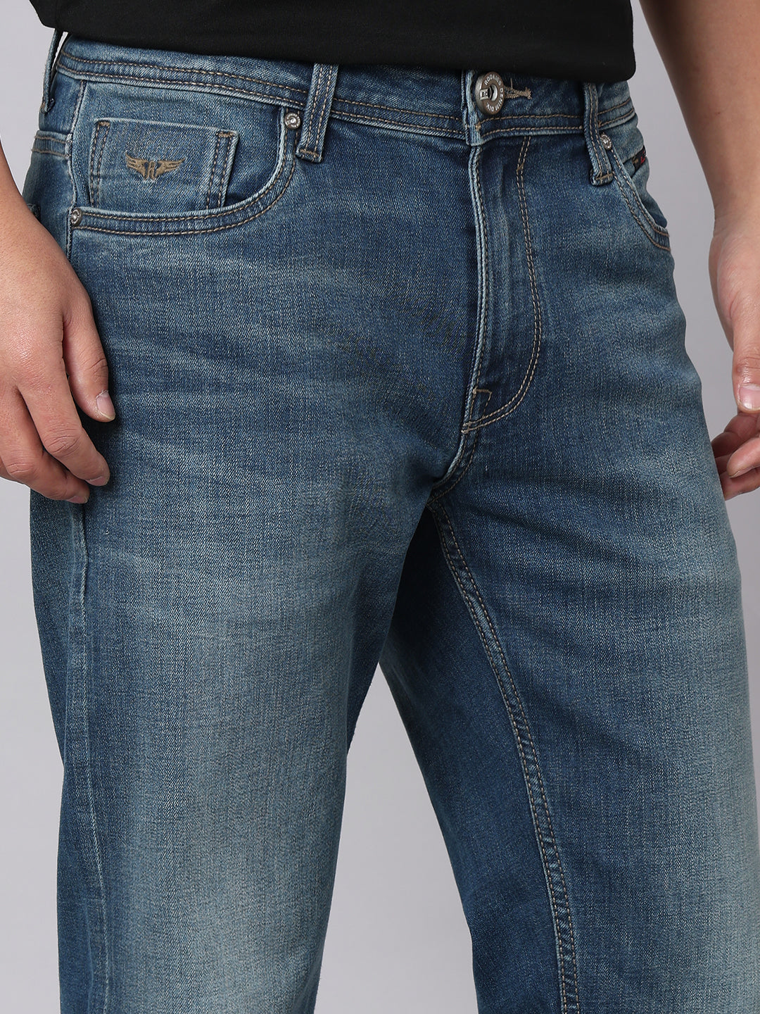 Med Blue Mid Rise Cropped Length Loose Boot Leg Stretch Jeans