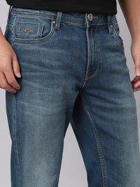 Med Blue Mid Rise Cropped Length Loose Boot Leg Stretch Jeans