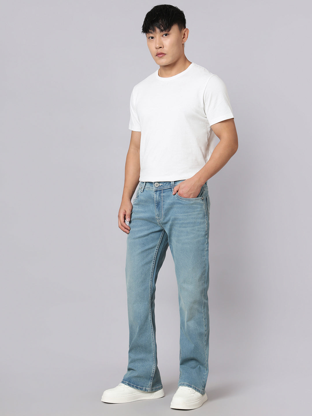 Light Blue Mid Rise Cropped Length Loose Boot Leg Stretch Jeans