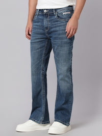 Med Blue Mid Rise Cropped Length Loose Boot Leg Stretch Jeans