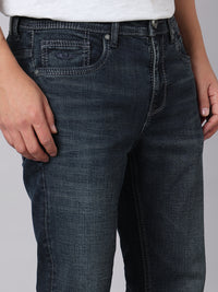Dark Blue Mid Rise Cropped Length Loose Boot Leg Stretch Jeans