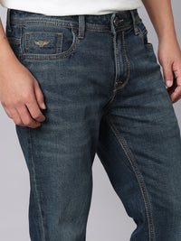 Dark Blue Mid Rise Cropped Length Loose Boot Leg Stretch Jeans