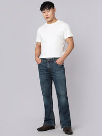 Dark Blue Mid Rise Cropped Length Loose Boot Leg Stretch Jeans