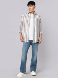 Med Blue Mid Rise Cropped Length Loose Boot Leg Stretch Jeans